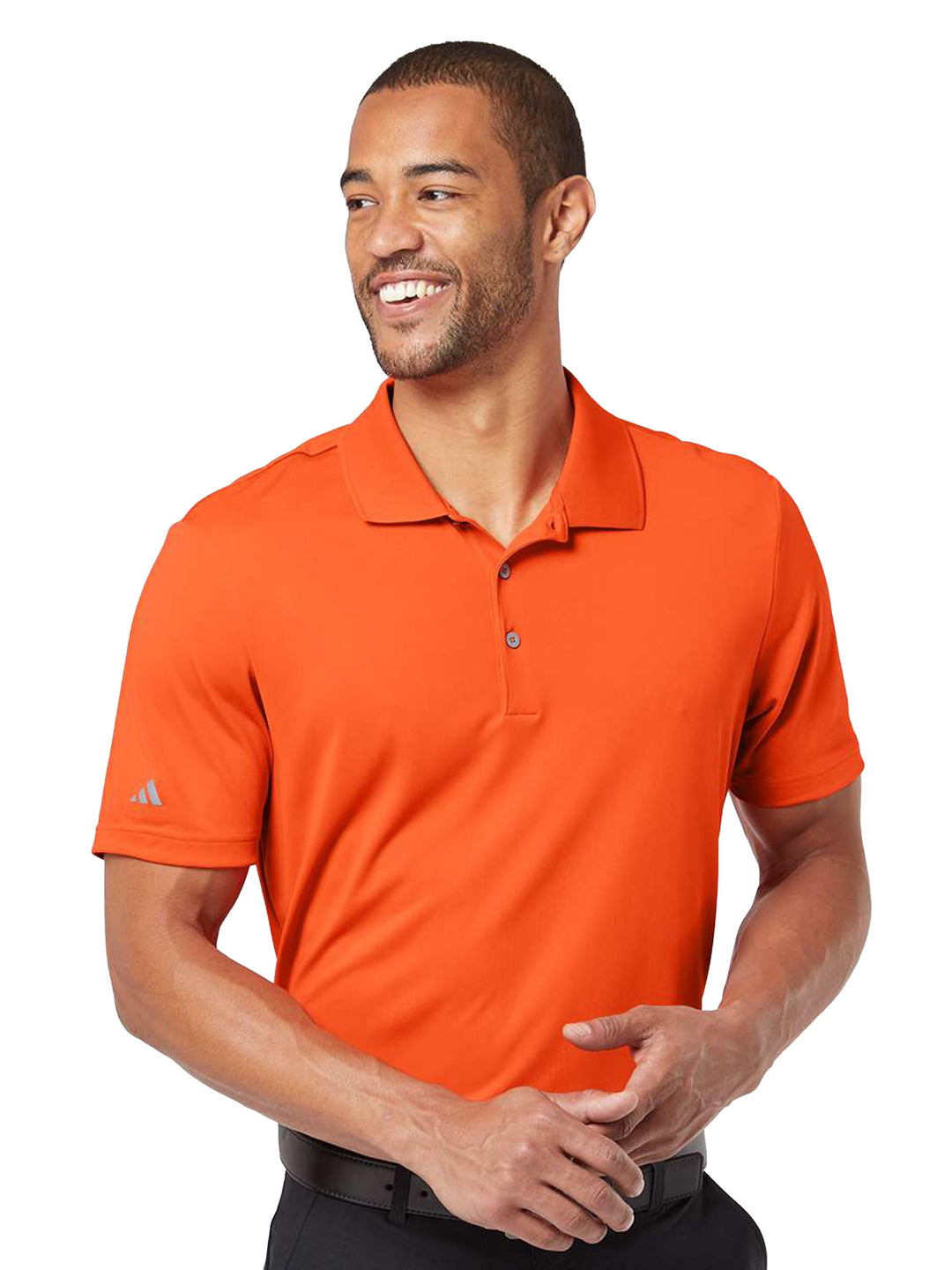 Bright orange Adidas Performance Polo with a modern, athletic fit. Customize yours at Kavy's Customs with no minimum order required.