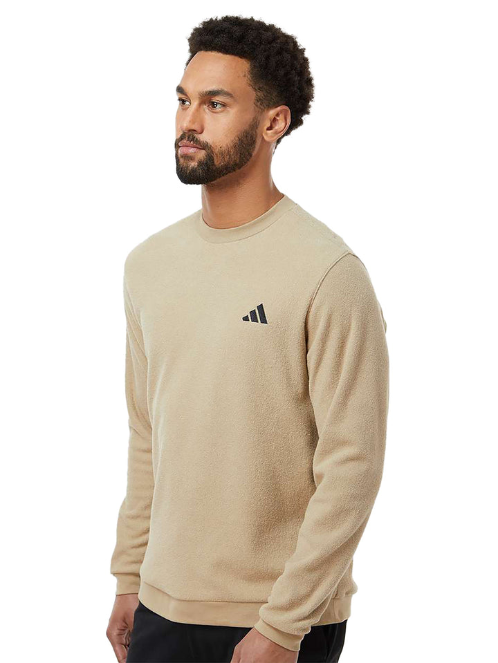 Beige Adidas crewneck sweatshirt with a minimalist embroidered logo on the chest. Soft, lightweight, and perfect for casual wear.