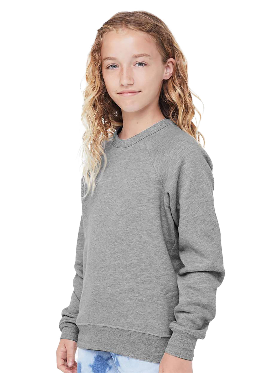 Side view of Bella and Canvas Youth Sponge Fleece Crewneck Sweatshirt in heather gray, showcasing its stylish raglan sleeves and cozy fabric.