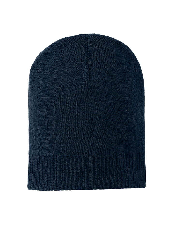 Port Authority® 100% Cotton Beanie CP95 in navy blue, offering a classic design with a stretchable fit. Perfect for layering in chilly weather.