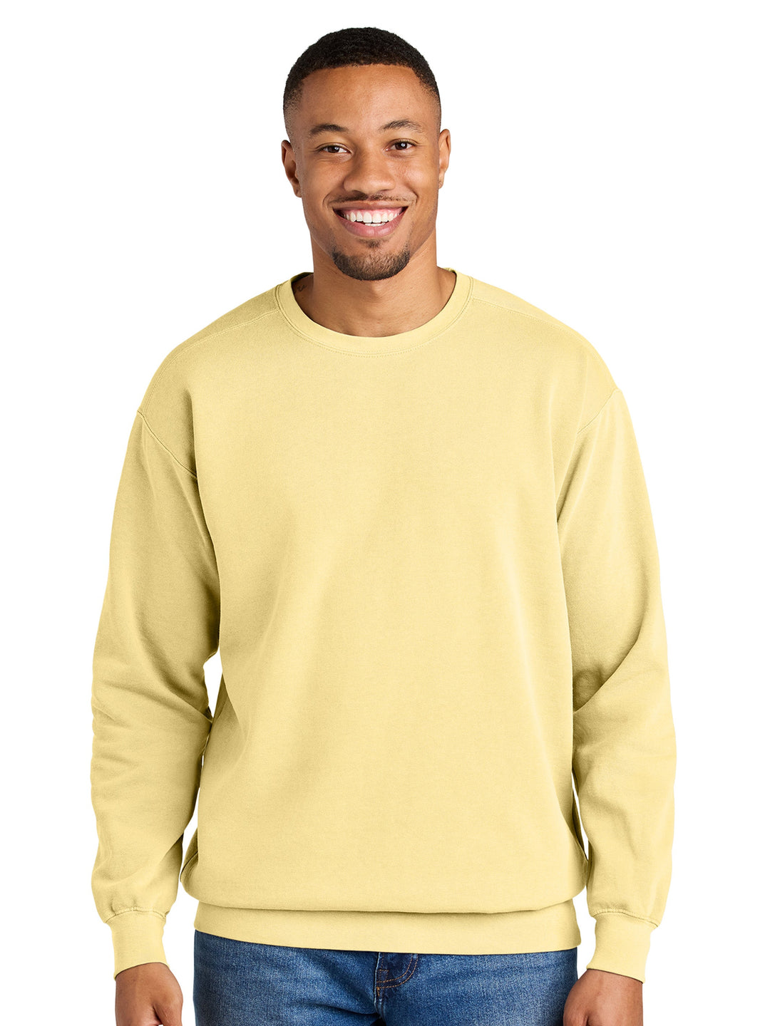 Comfort Colors Ring Spun Crewneck in a soft yellow shade, featuring a relaxed fit and heavyweight fabric. Perfect for customization with logos or designs.