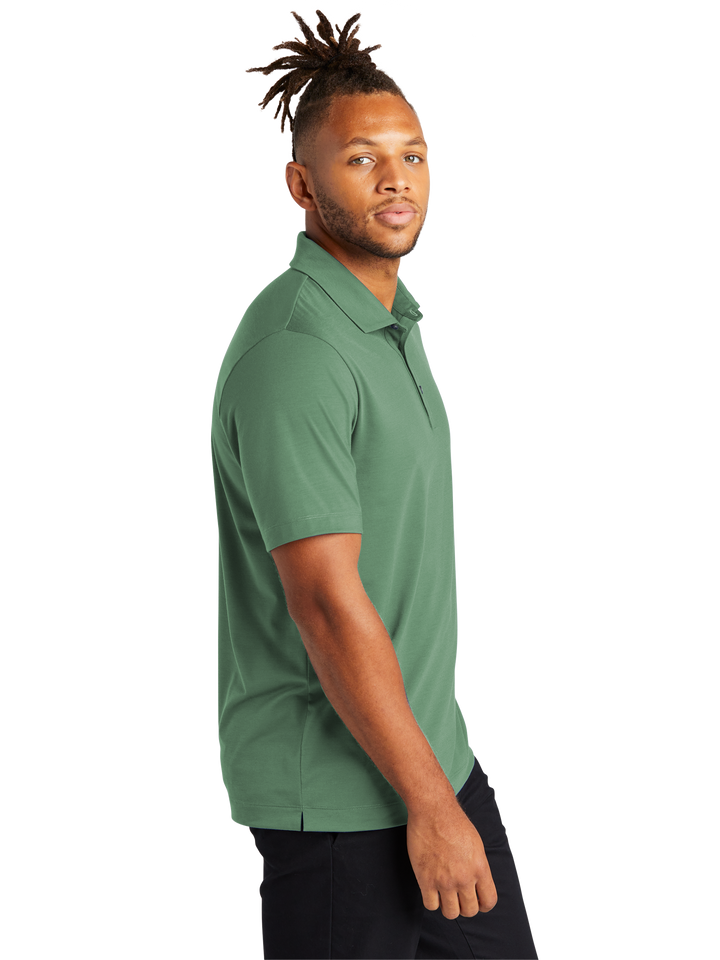 Side view of the Mercer+Mettle Stretch Jersey Polo in green, highlighting its breathable fabric and modern design. Great for a stylish and relaxed look.