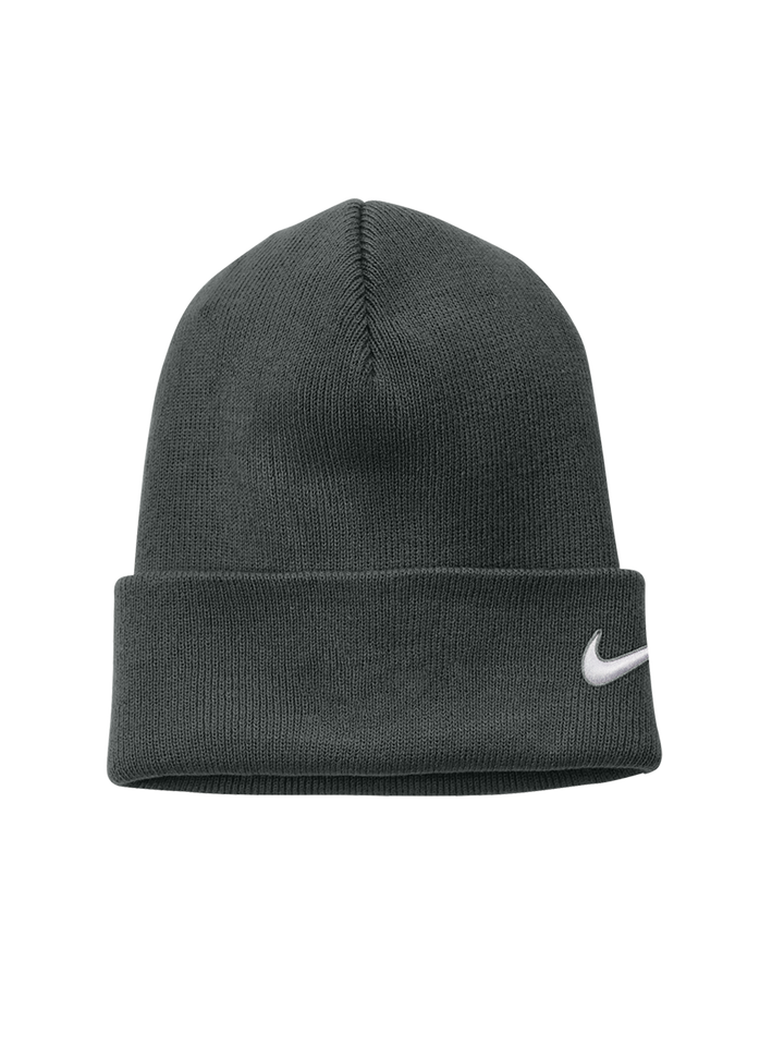 Dark gray Nike Team Cuffed Beanie with an embroidered white swoosh logo on the side of the cuff. Cozy and stylish winter accessory.