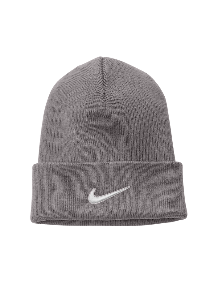 Light gray Nike Team Cuffed Beanie with a centered white swoosh logo. Soft knit fabric ensures warmth and comfort.