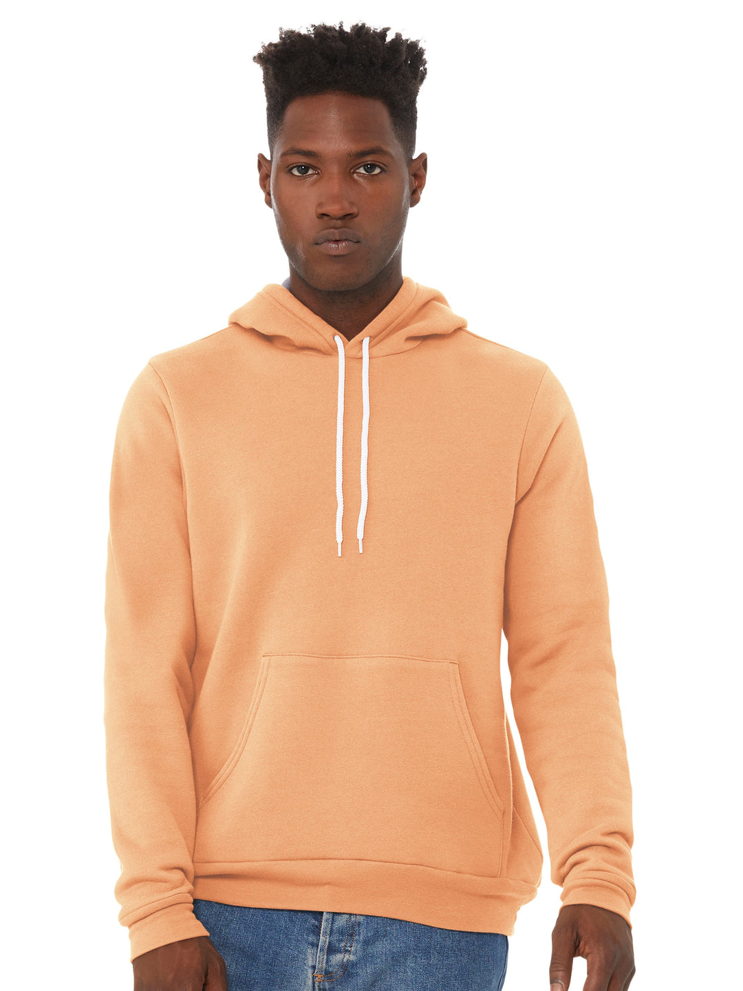 Bella + Canvas Sponge Fleece Hoodie in peach, designed for comfort with a front pocket and white drawstrings. Ideal for custom printing or embroidery.
