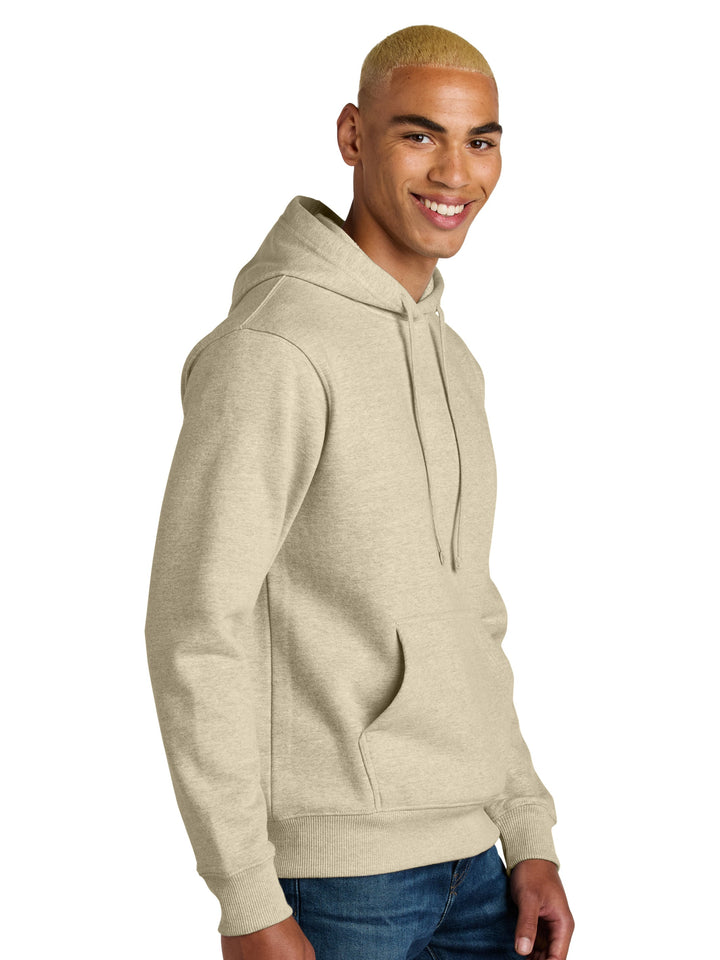 Side view of the Custom District V.I.T Heavy Weight Hoodie in beige, showcasing its relaxed fit, ribbed cuffs, and soft fabric.