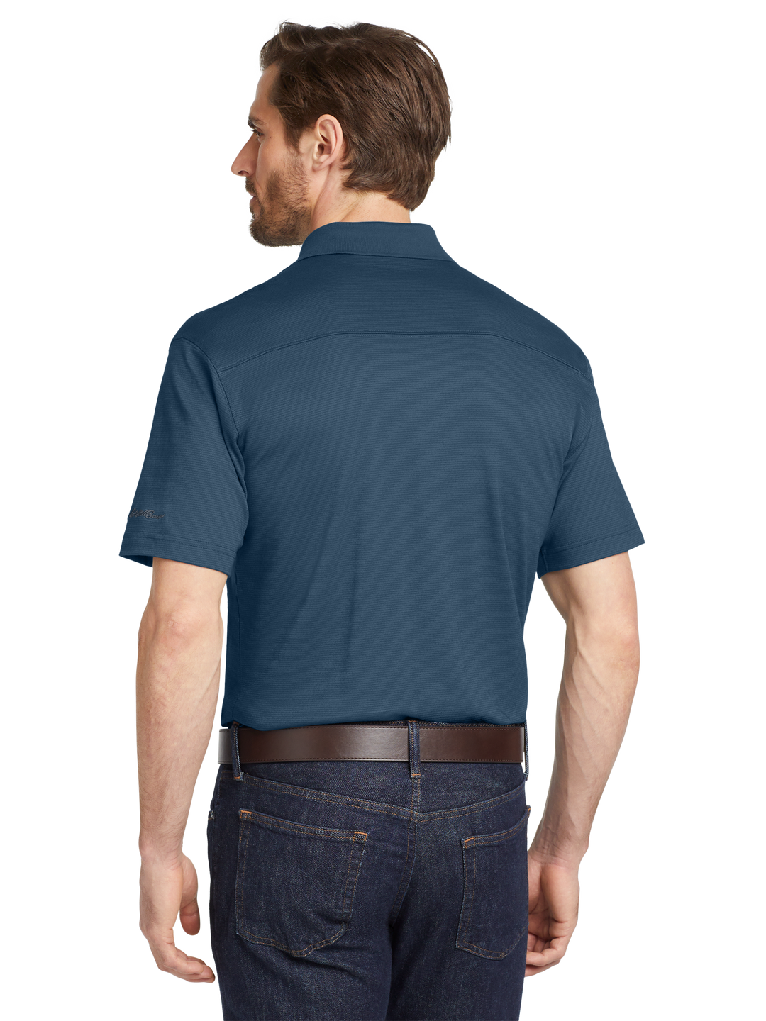 Back view of Eddie Bauer® Performance Polo in deep blue, highlighting durable stitching and a comfortable fit. Perfect for work or leisure.