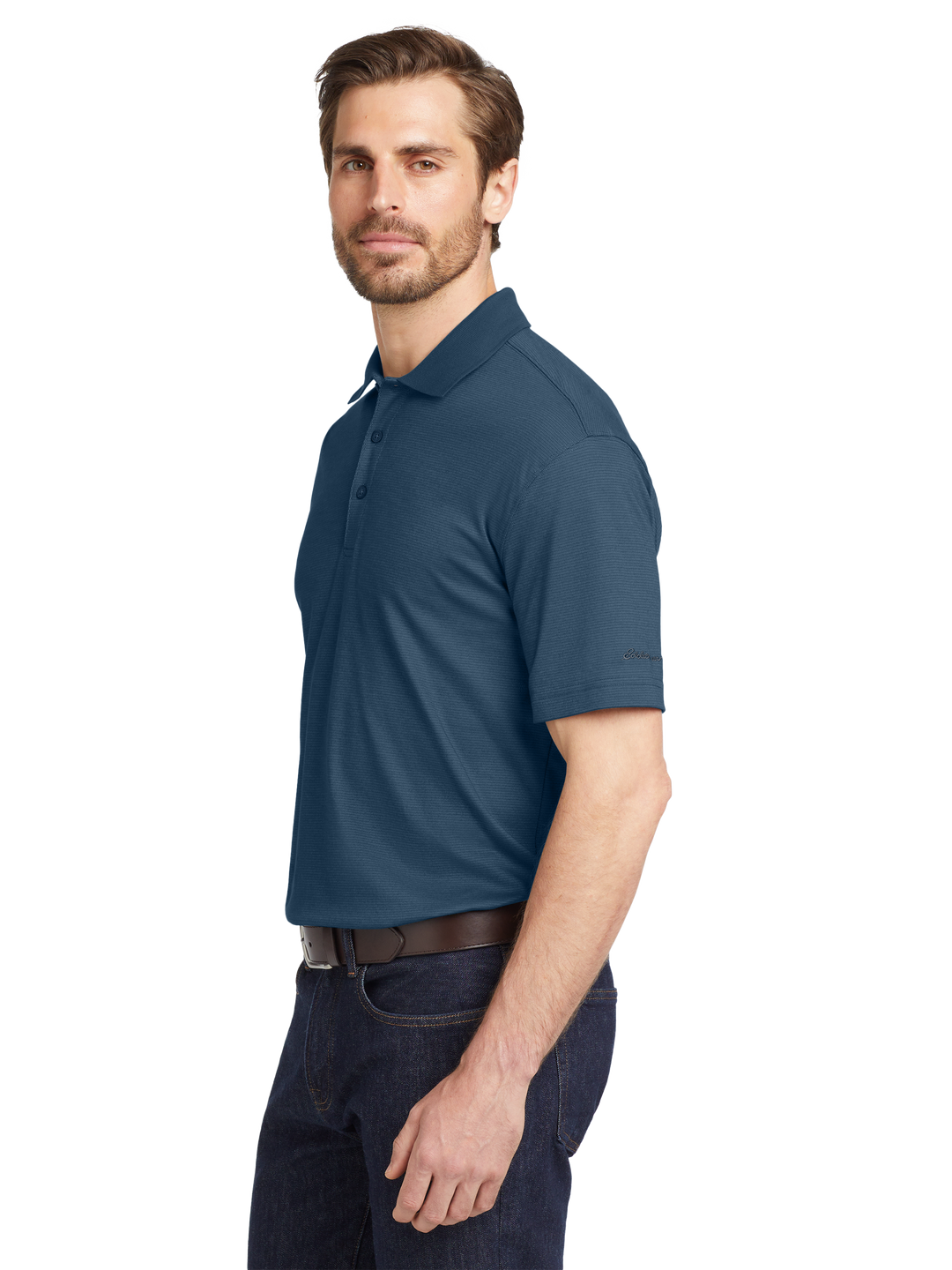 Side view of Eddie Bauer® Performance Polo in deep blue, showcasing breathable fabric and a sleek fit. Ideal for casual and professional wear.