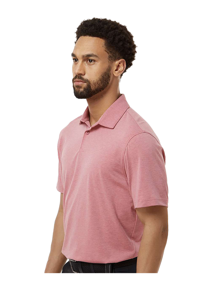 Side view of the Adidas Blend Polo in pink, showcasing its modern fit and breathable fabric. Ideal for a stylish and comfortable professional look.
