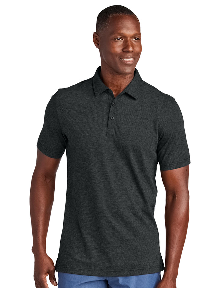 TravisMathew Sunnyvale Polo in black, designed with a three-button placket and soft, breathable fabric. Customize with your logo for a professional look.