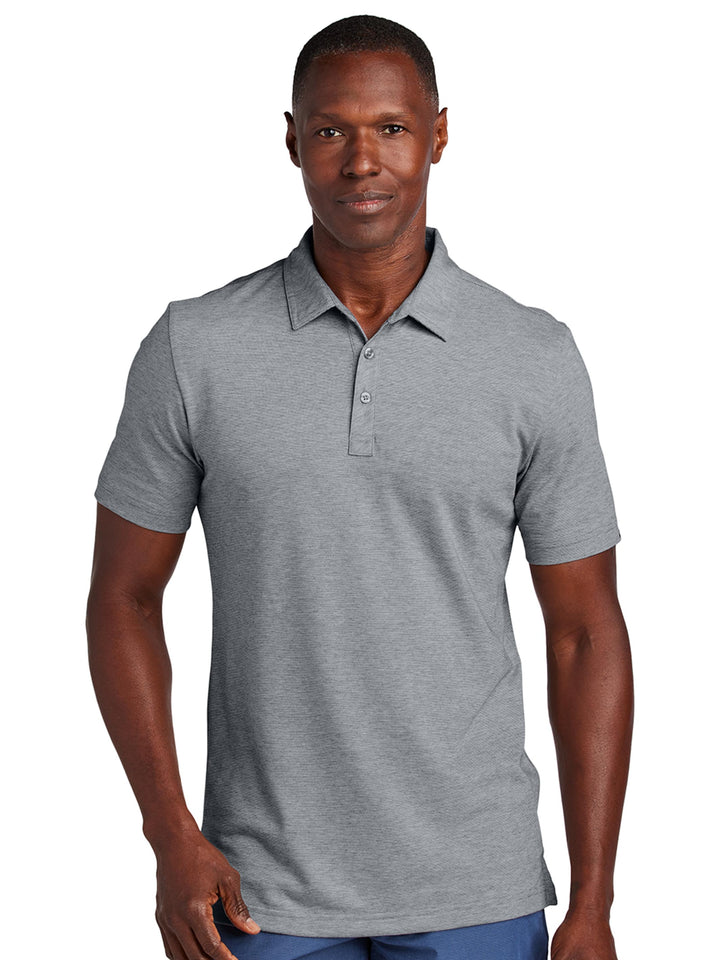 Front view of the TravisMathew Sunnyvale Polo in heather gray, featuring a stylish and comfortable design. Customize with embroidery or screen printing.
