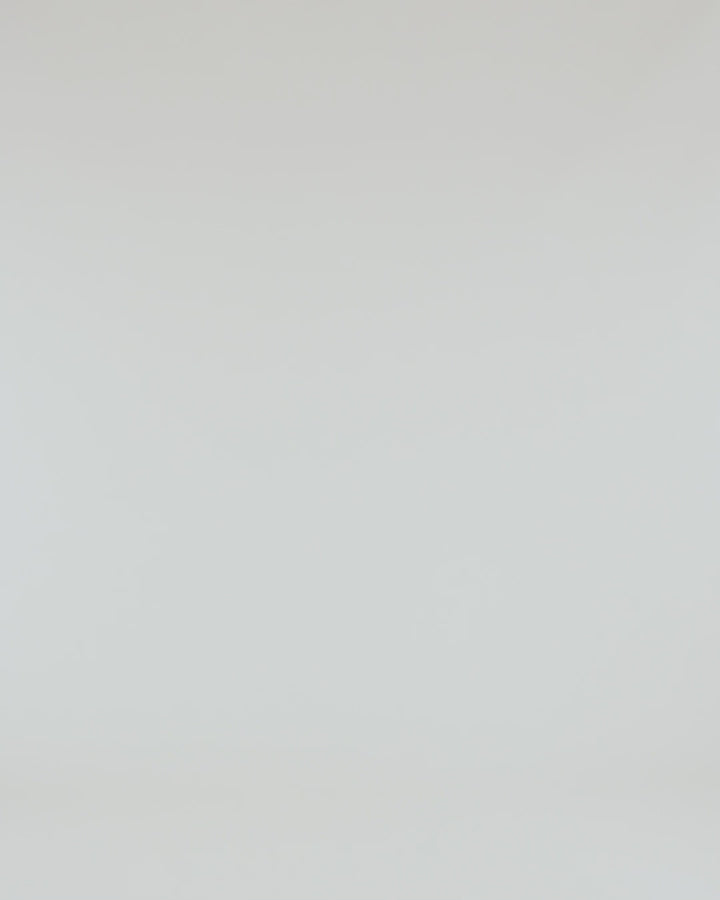 Close-up of the fabric texture of the Independent Trading Co Premium Heavy Weight Cross-Grain Hoodie in white.