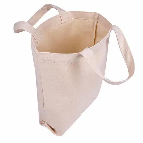 Plain beige canvas tote bag with sturdy handles and spacious interior. Ideal for customization, shopping, or daily essentials.