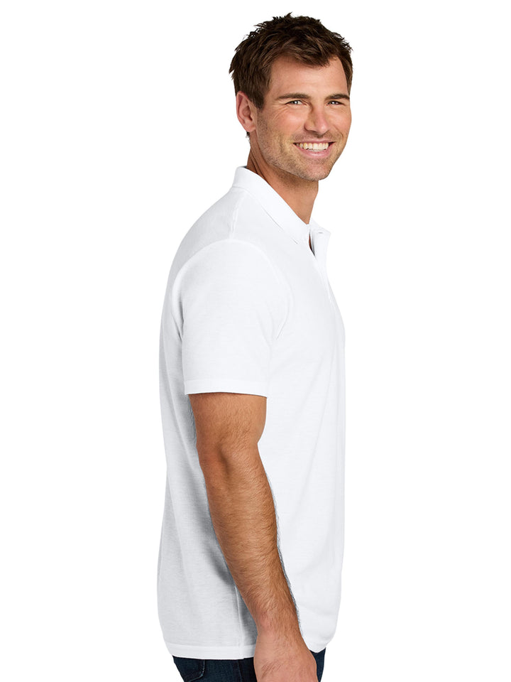 Side view of the Gildan Softstyle Adult Pique Polo in white, showcasing its tailored fit and breathable cotton fabric for all-day comfort.