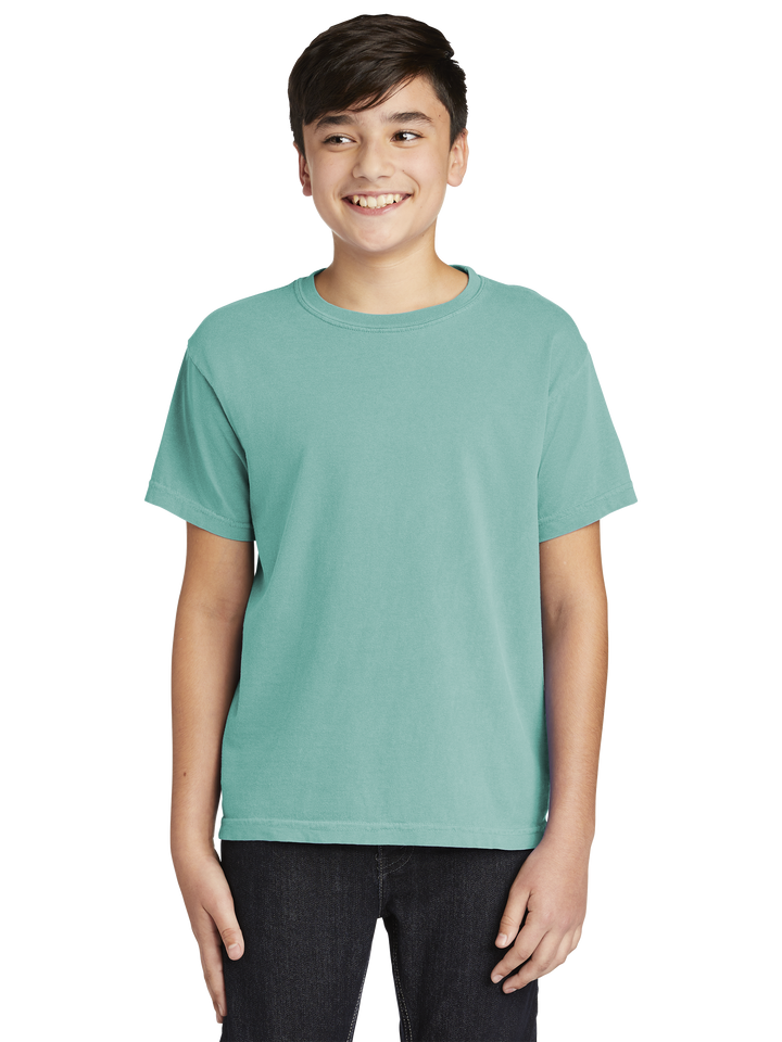 Comfort Colors Youth Heavyweight Ring Spun Tee- 9018 in a soft teal shade, featuring a classic crew neck and short sleeves for a relaxed fit.