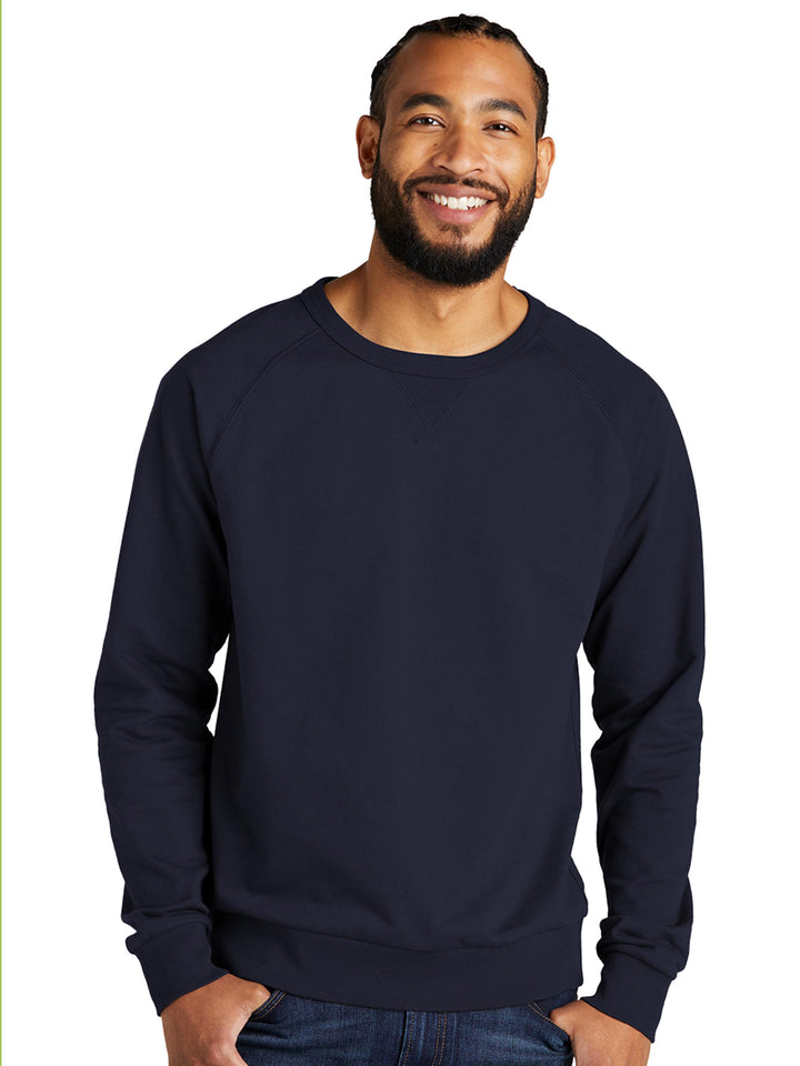 Custom Allmade Organic French Terry Crewneck in navy blue, worn by a male model. Made from 100% organic cotton for a premium feel.