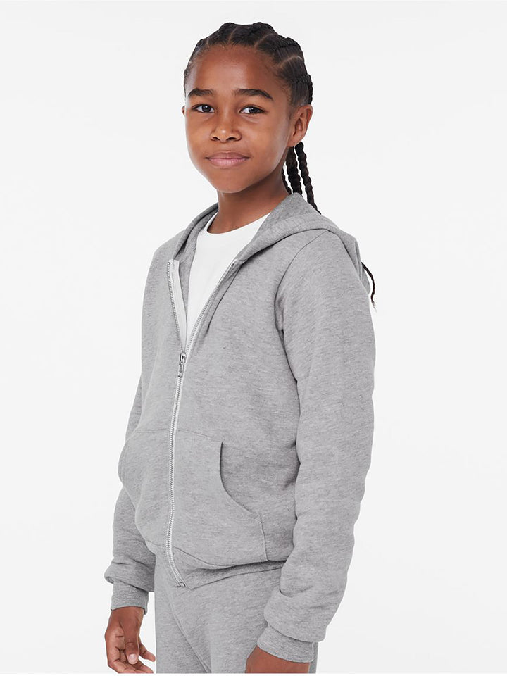 Youth wearing Bella and Canvas grey fleece zip-up hoodie side view