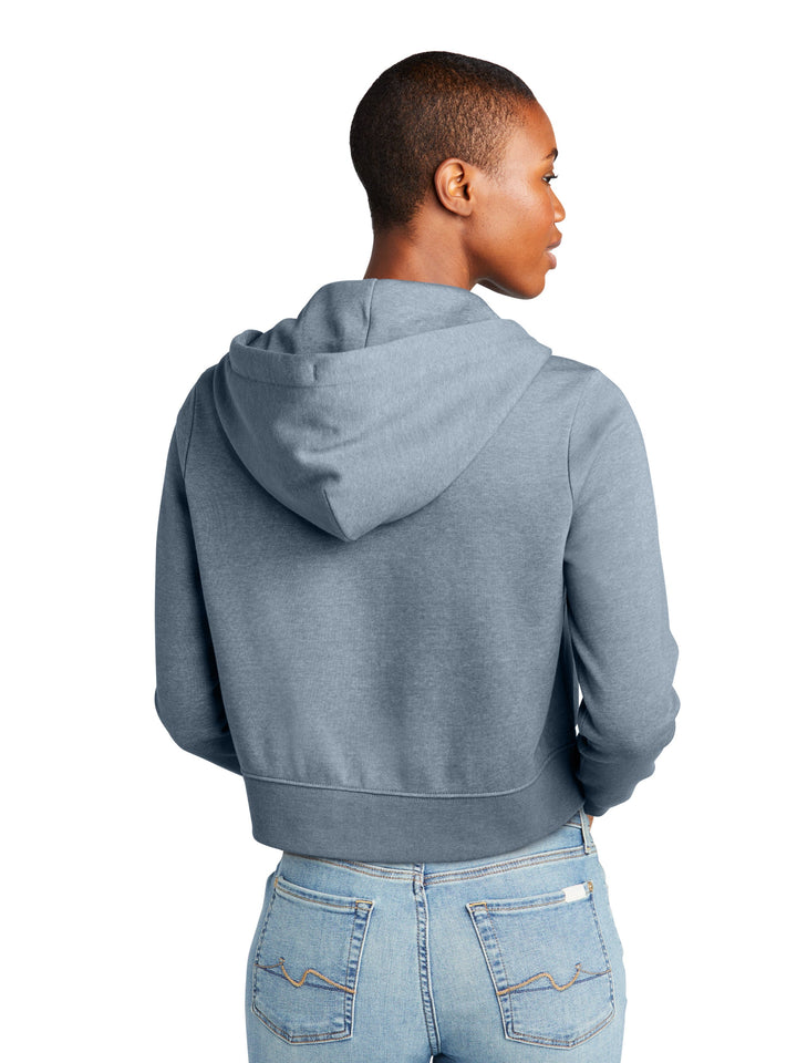 Back view of a Custom District Women’s Zip-Up Hoodie in blue, highlighting the hood and ribbed hem. Great for custom logos or designs.