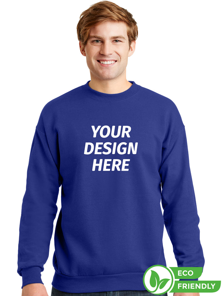 Custom Hanes EcoSmart Crewneck Sweatshirt in royal blue with 'Your Design Here' text. Made from recycled materials for comfort and sustainability.