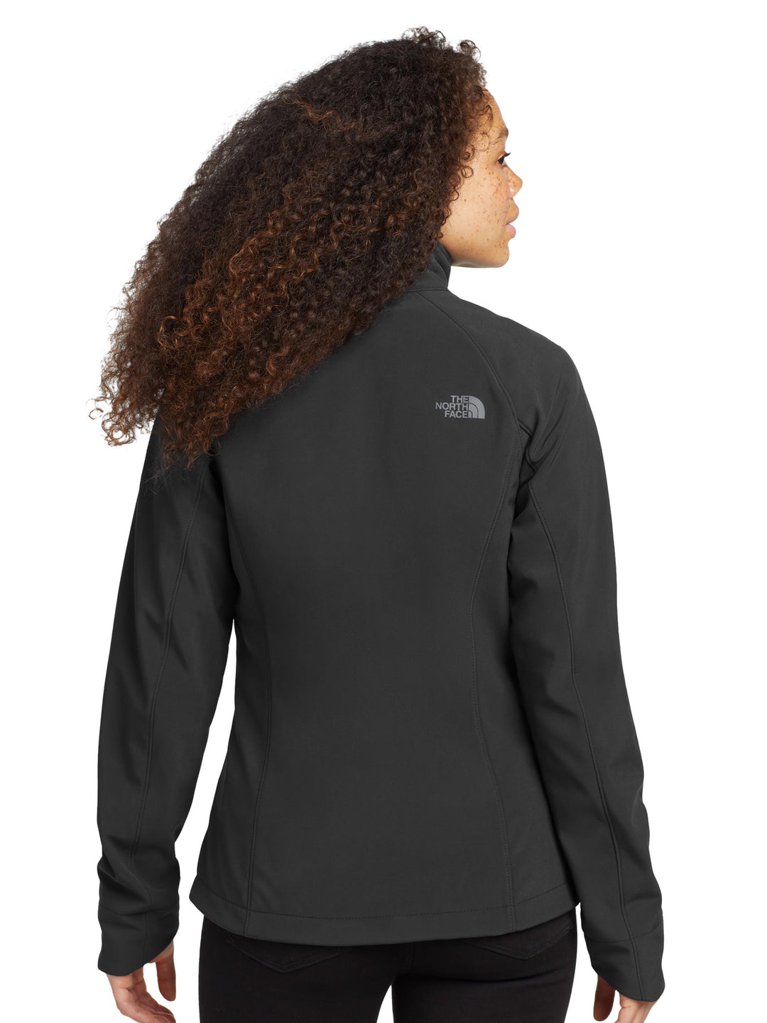 Back view of The North Face® Women's Apex Barrier Soft Shell Jacket in black, showcasing tailored fit and windproof design for outdoor wear.