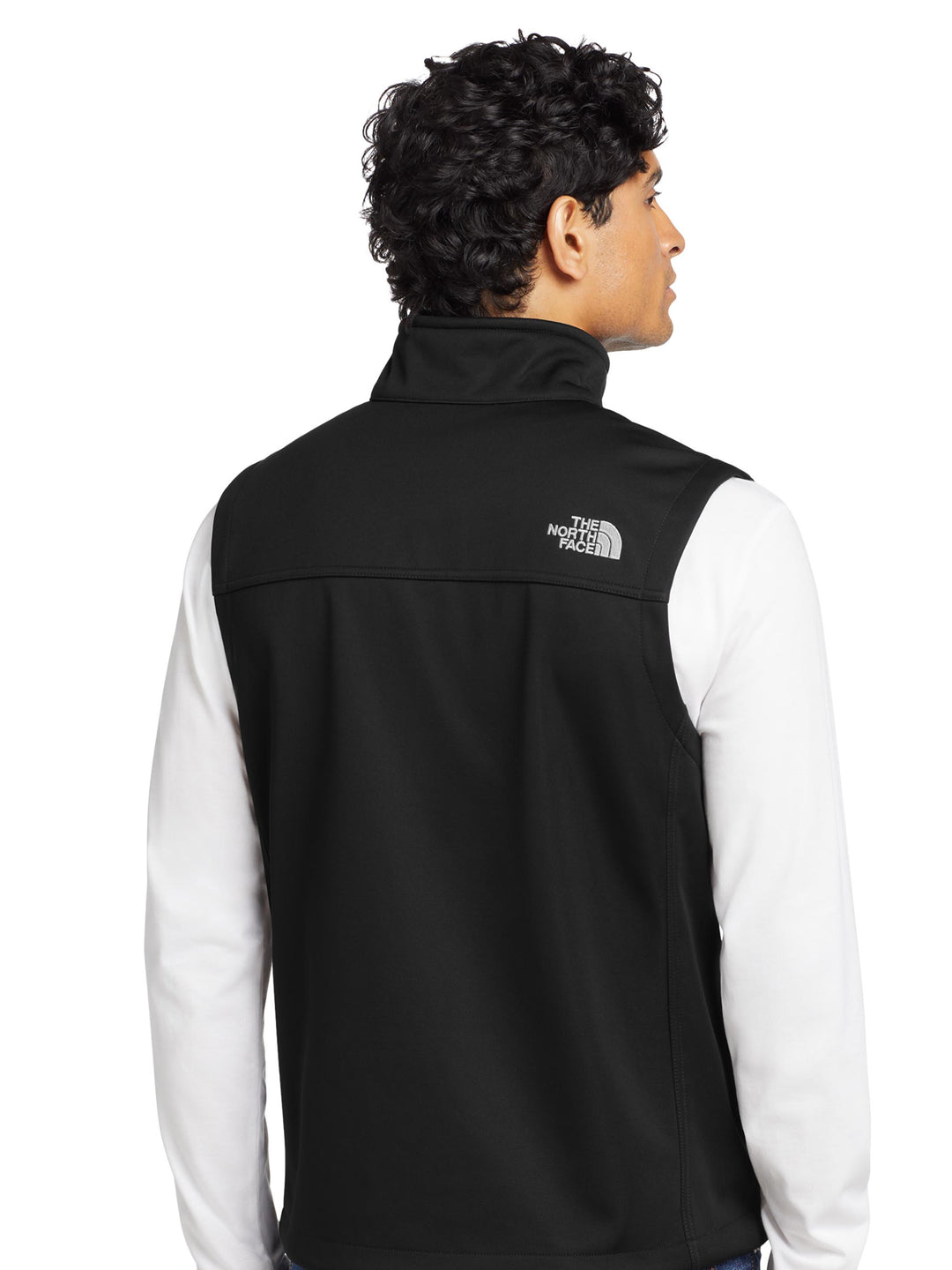 Back view of The North Face® Ridgewall Soft Shell Vest in black, featuring The North Face® logo on shoulder, perfect for workwear customization.