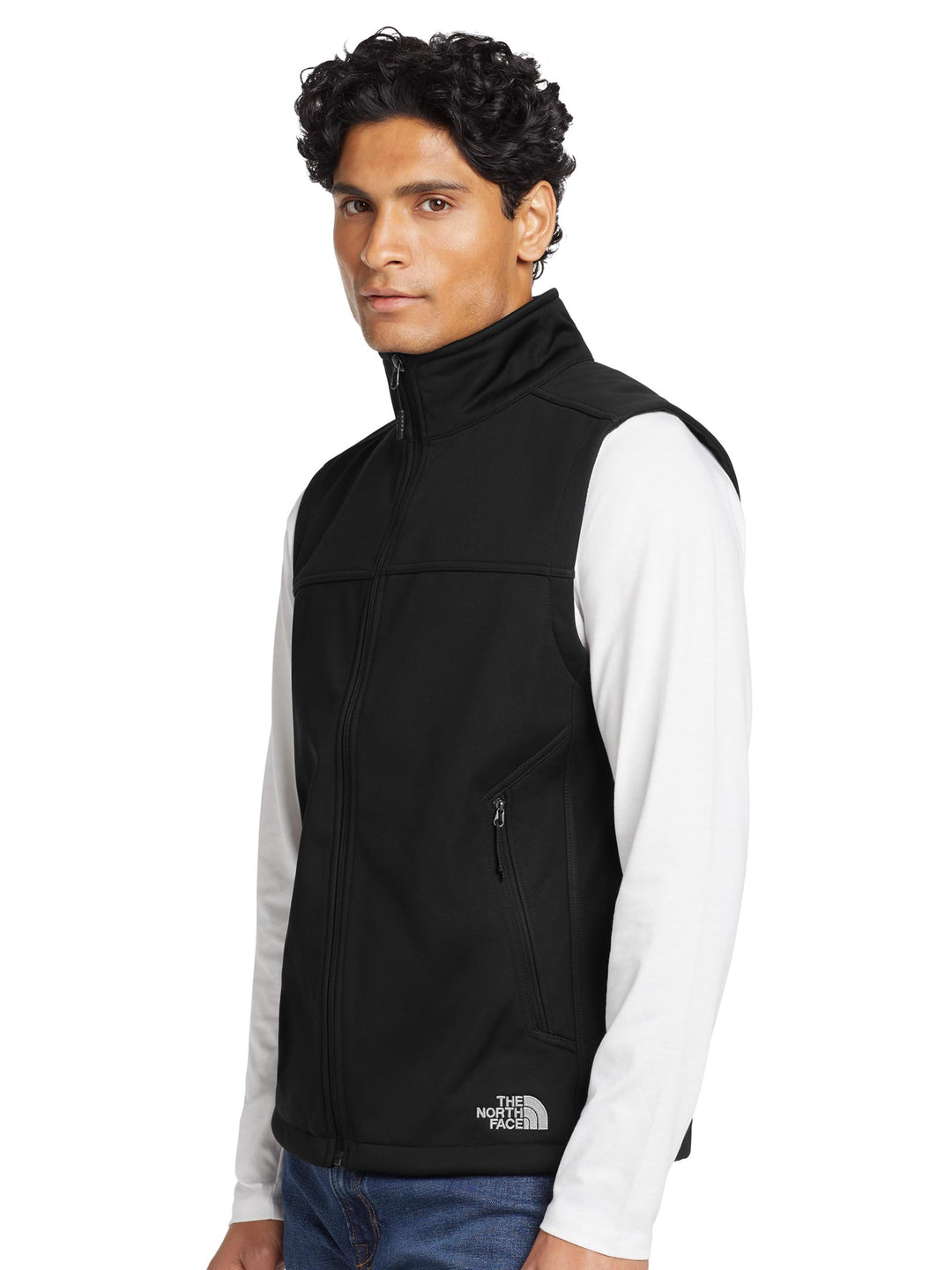 Side view of The North Face® Ridgewall Soft Shell Vest in black, showcasing zippered pockets and sleek design for custom vest embroidery.