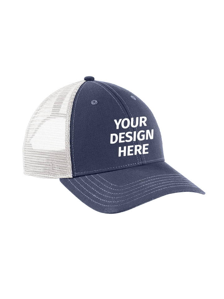 Customizable The North Face Ultimate Trucker Cap in navy with white mesh back, ideal for personalized branding in apparel accessories.