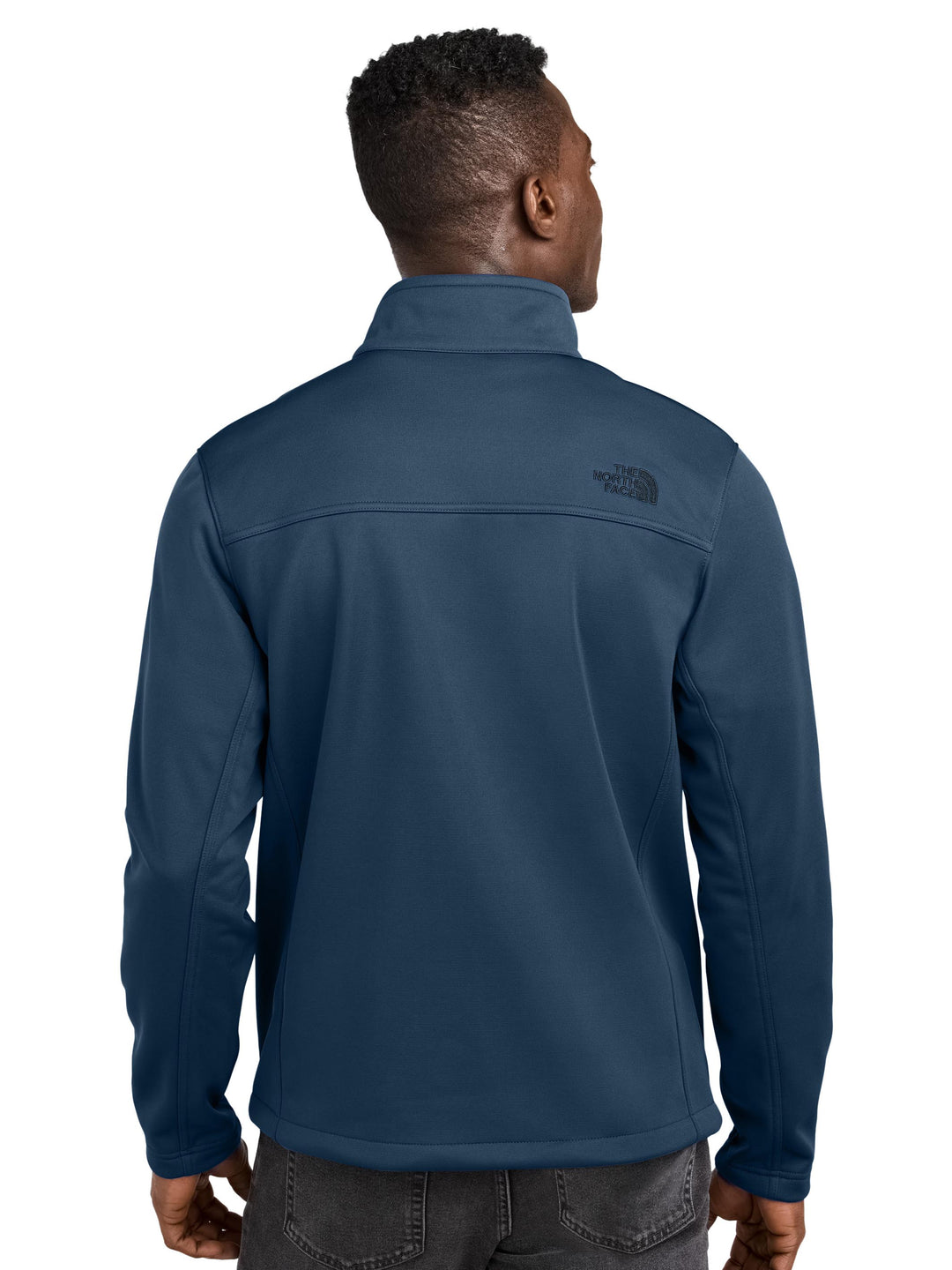 Back view of The North Face® Chest Logo Ridgewall Soft Shell Jacket in navy, showcasing sleek, wind-resistant design for outdoor use.