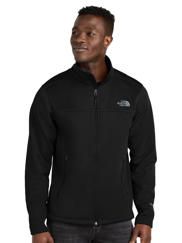 The North Face® Chest Logo Ridgewall Soft Shell Jacket in black, designed for durability and comfort in outdoor or work environments.