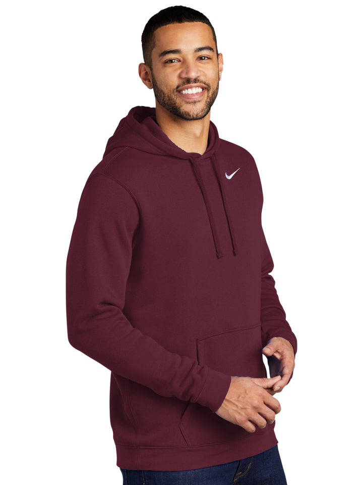 Personalized Nike Club Fleece Hoodie in maroon, featuring a sleek fit and embroidered Nike logo. Ideal for custom embroidery or team branding.