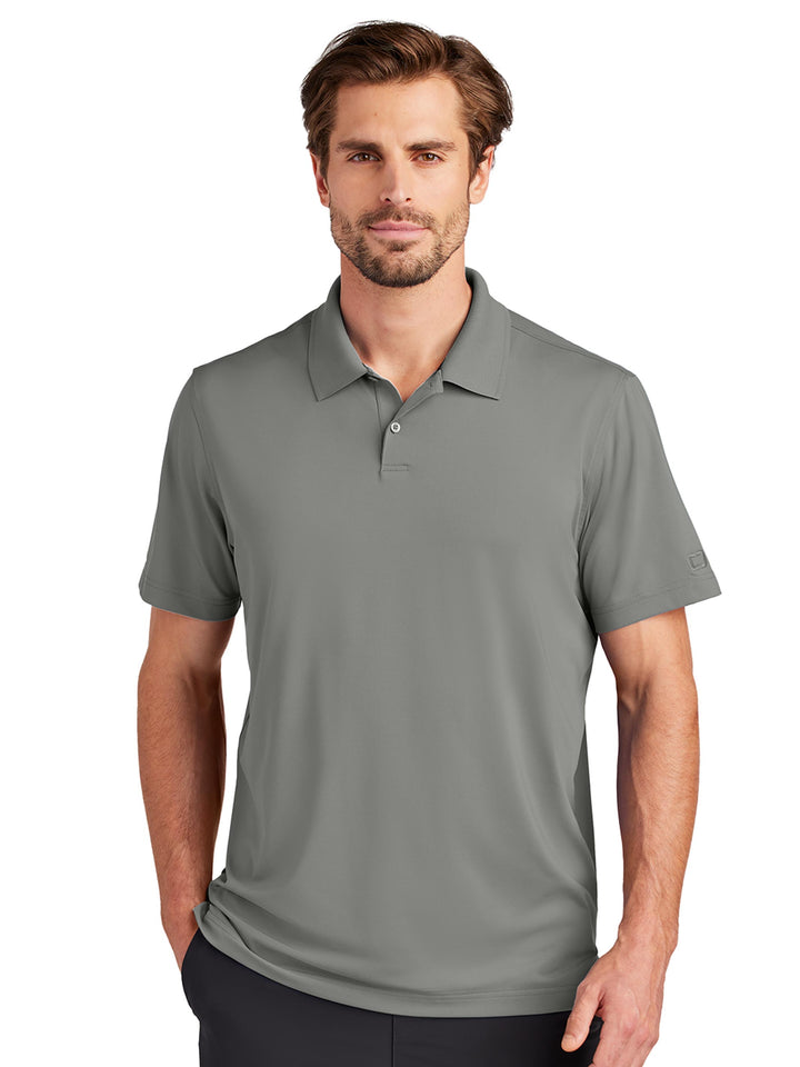 Custom OGIO Regain Polo in gray, designed for comfort and durability with moisture-wicking fabric. Customize with your logo for a professional touch.