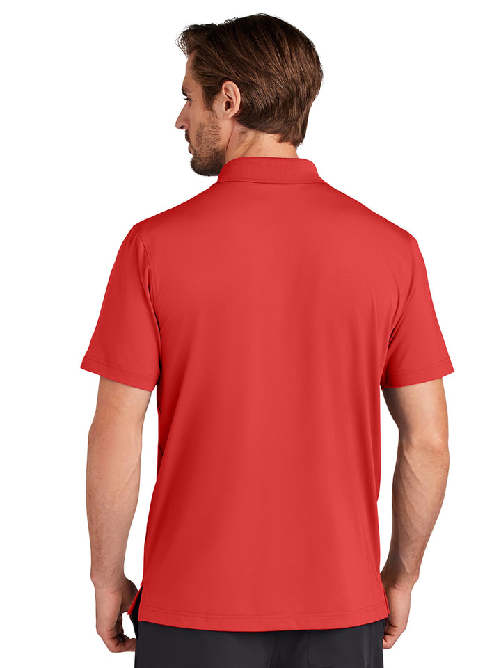 Back view of the Custom OGIO Regain Polo in red, highlighting its breathable and flexible fabric. Perfect for corporate or casual styling.