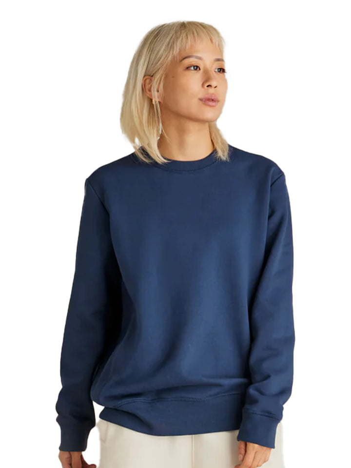 Navy blue Original Favorites crewneck sweatshirt worn by a female model. Comfortable heavyweight fabric for a stylish look.