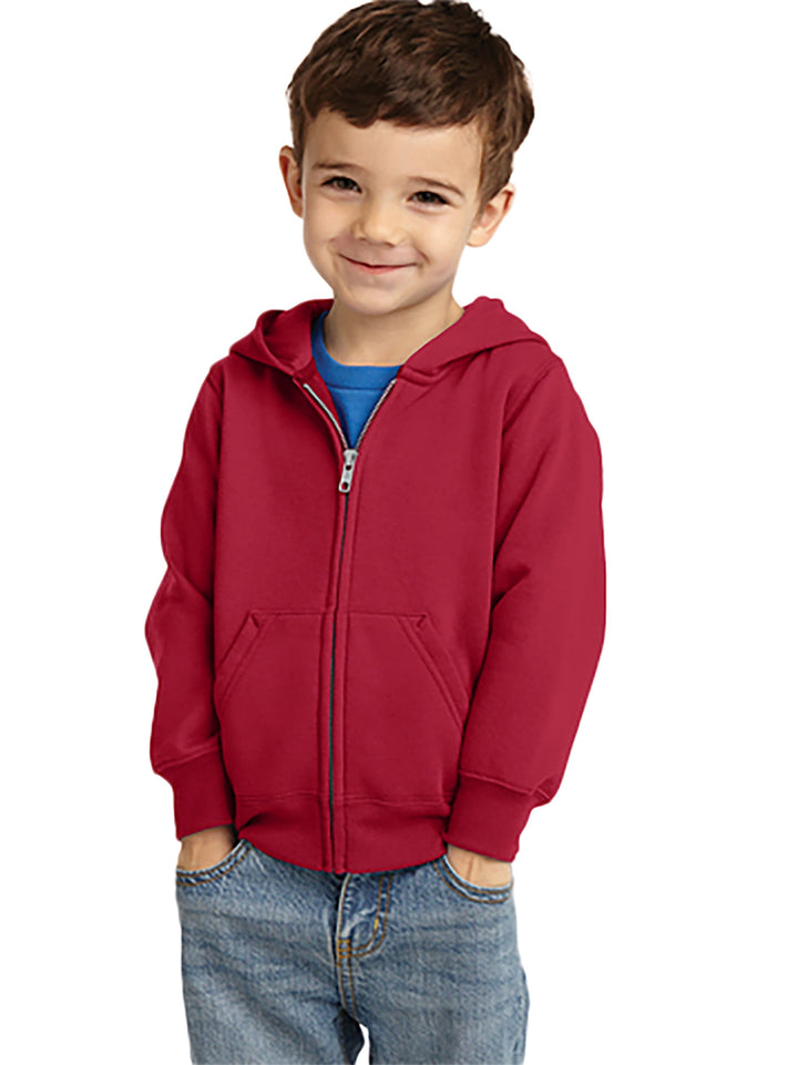 Port and Company Toddler Core Fleece Zip Up Hoodie in red, featuring a cozy cotton-poly blend with a front zipper and pockets for warmth and comfort.