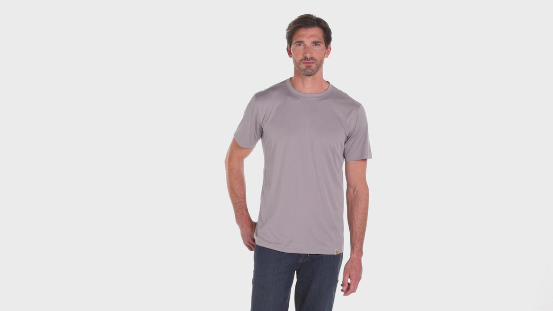Model wearing Custom Carhartt Force Sun Defender Short Sleeve T-Shirt in light gray, perfect for rugged team uniforms and embroidery.